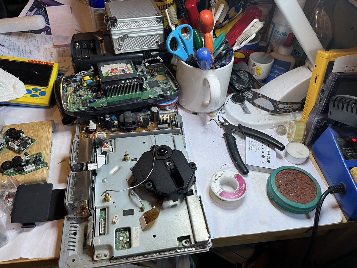 adithompson01's tweet photo. Ps1 not reading discs resurrected after I noticed some loose solder joints connecting the laser #ps1 #retro https://t.co/TxqwDBRoA6
