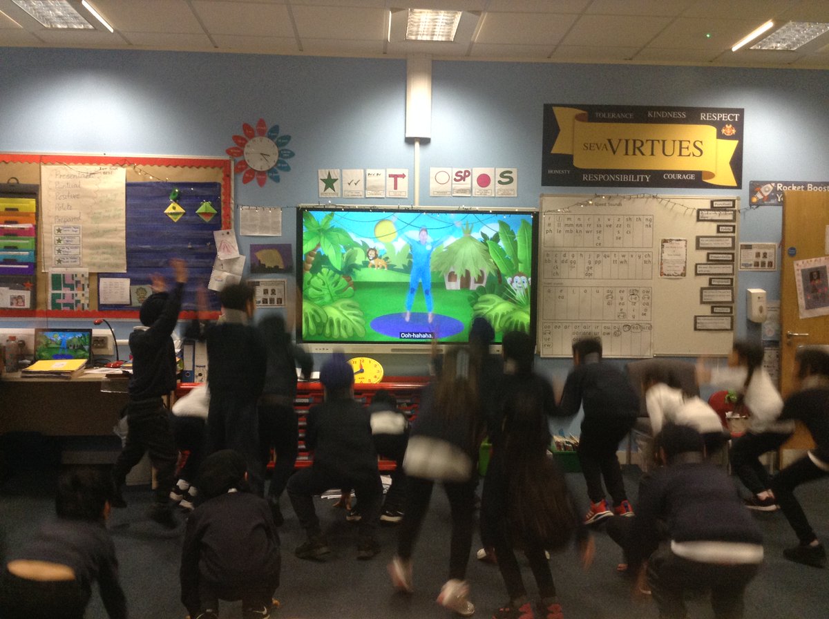 SevaSchool's tweet photo. Year One and Two enjoying some Yoga during enrichment yesterday.  The blurred picture is an action shot. https://t.co/TCLn3g0NGn