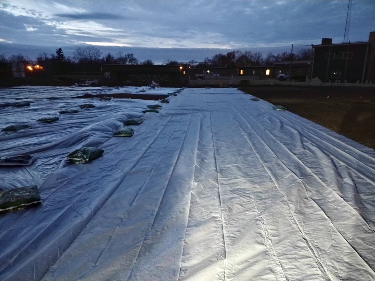 Turfdogs's tweet photo. Late Fall weather always makes field construction interesting but look at this beautiful @HgtSod @BarenbrugUSA going down @NCTrojansBSBL @NCTrojans. Even had to tarp to ward off rain. Mound &amp; Plate are taking shape w/ @DuraEdge clays. This is going to be one beautiful new field https://t.co/yOMOaaRLlr