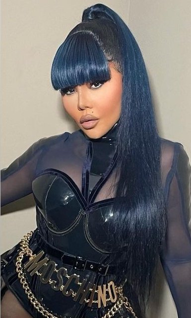 Lil Kim in blue hair.