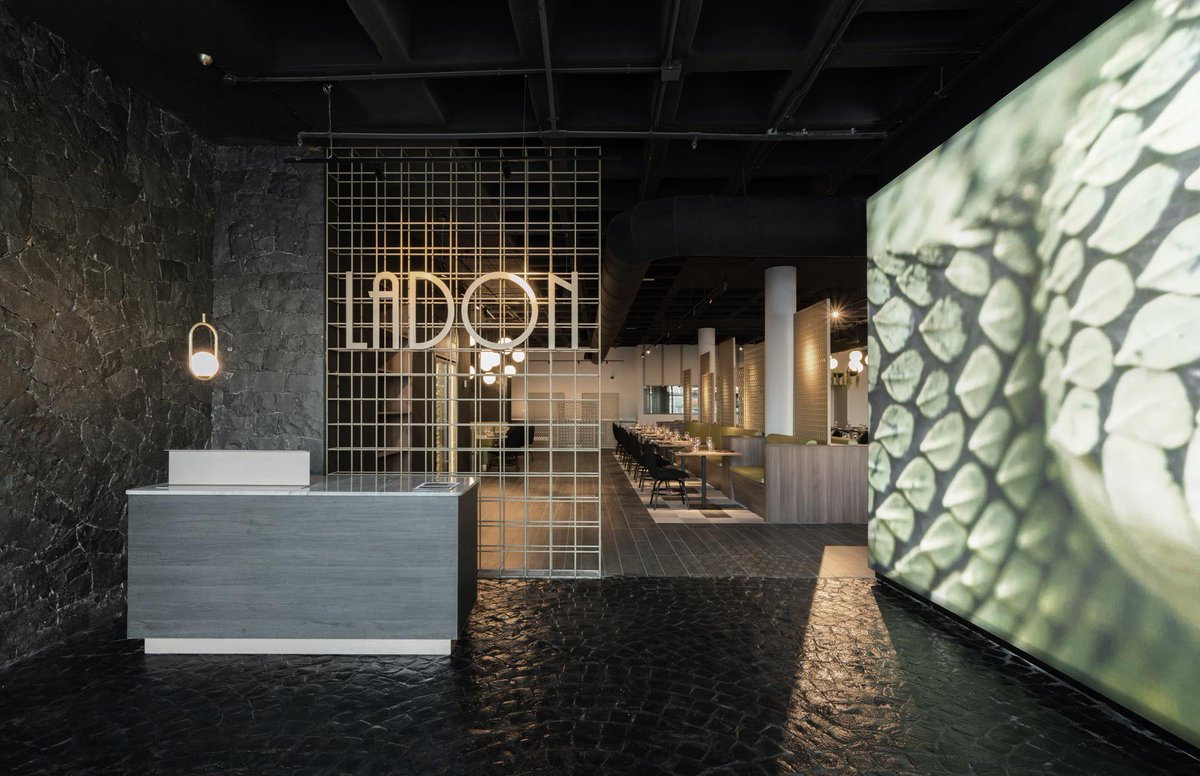 Volcanic stone walls and floors greet you as you enter this restaurant. #archilovers #structures  cpix.me/a/134577130