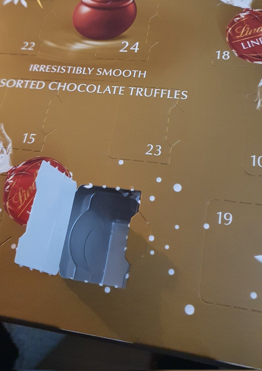 Tezamabot's tweet photo. Have to say, not a very Christmassy advent calendar, @Lindt! You could have put a little Christmas scene inside the door, no? For £10, I think you could have made a bit more of an effort #AdventCalendar #poorshow https://t.co/8Z0DrVp1Fu