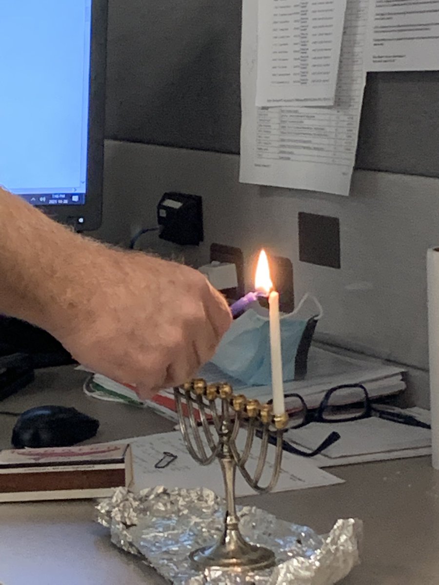 My friend and coworker celebrates the first day of Hanukkah.