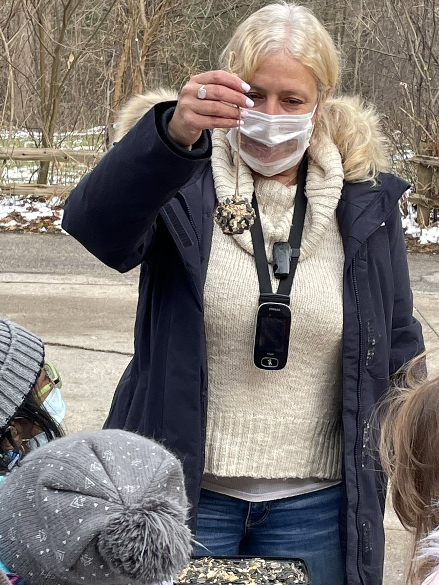 Carefully noting instructions to ensure the absolutely perfect construction of a pinecone bird feeder with <a href="/TDSB_Bridlewood/">Bridlewood JPS</a> #toes_tdsb #oememories