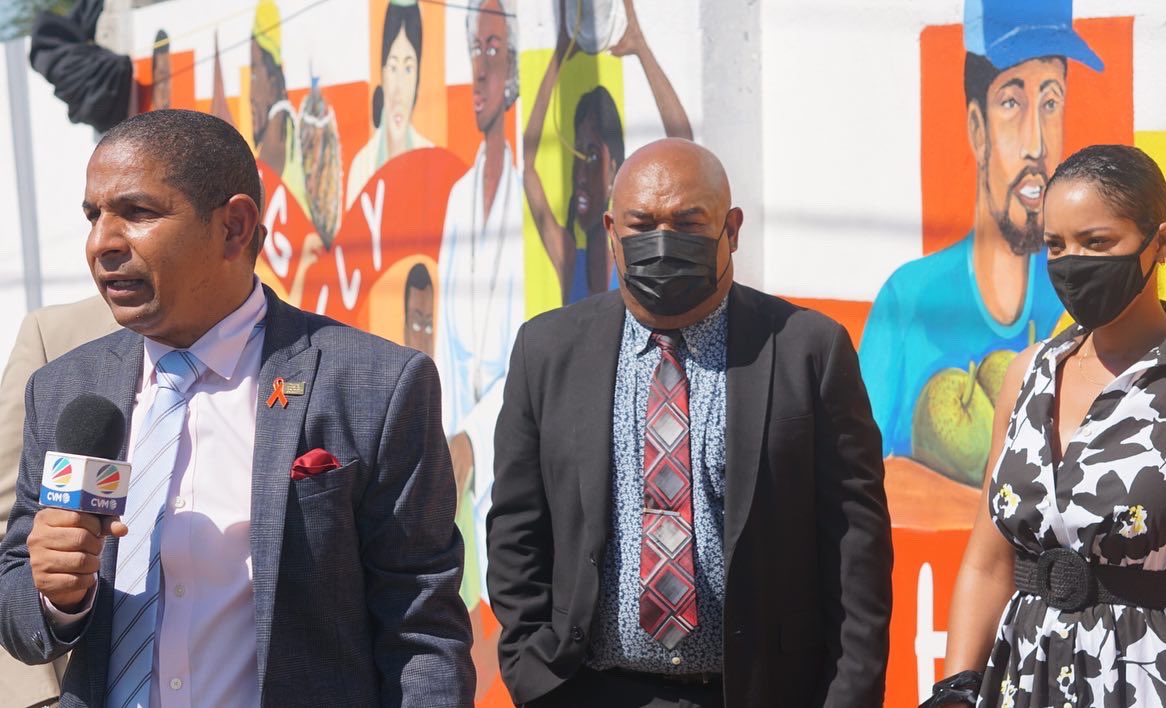 kgninred's tweet photo. Today we unveiled the mural on Pechon Street, Downtown Kingston in commemoration of #WorldAIDSDay2021. 

Artist: Makeida Beckford https://t.co/o14CWuETfX