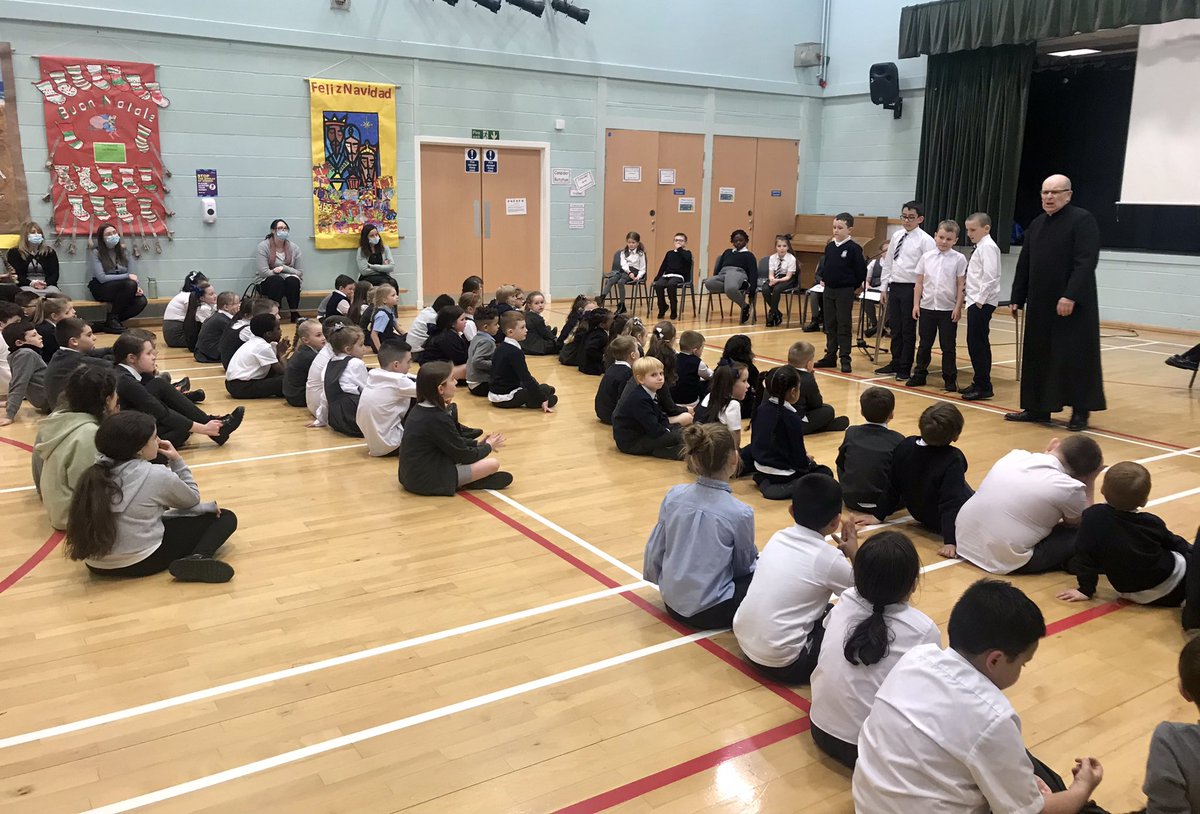 StDavids4's tweet photo. Today we welcomed Fr Bergin again into our school to celebrate the first of our Advent services 💜✝️💜 P3/4 led the service and lit the first candle on our Advent wreath. #Advent #prepareforJesus 💙🤍🖤 @rcmotherwell @motherwellre https://t.co/Vrvav46ljy