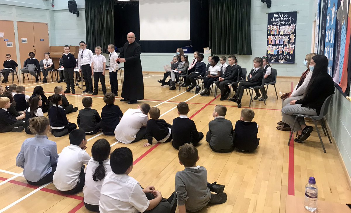 StDavids4's tweet photo. Today we welcomed Fr Bergin again into our school to celebrate the first of our Advent services 💜✝️💜 P3/4 led the service and lit the first candle on our Advent wreath. #Advent #prepareforJesus 💙🤍🖤 @rcmotherwell @motherwellre https://t.co/Vrvav46ljy