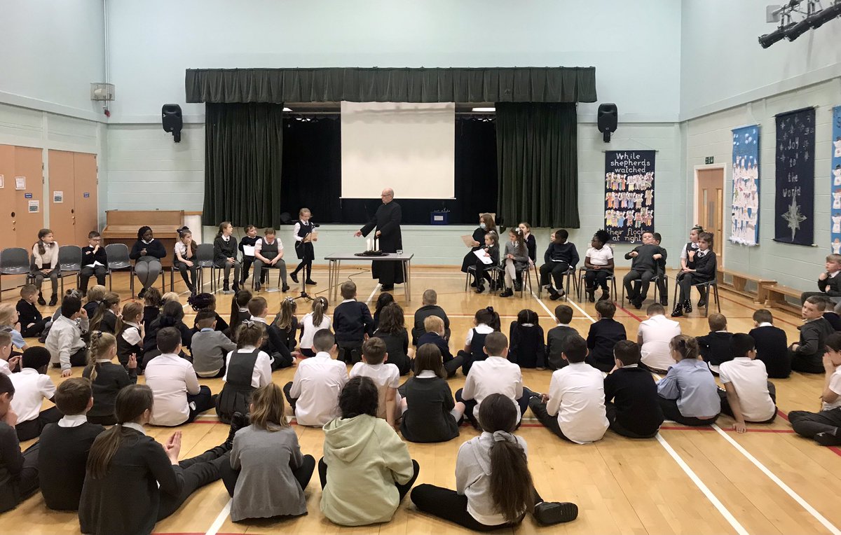 StDavids4's tweet photo. Today we welcomed Fr Bergin again into our school to celebrate the first of our Advent services 💜✝️💜 P3/4 led the service and lit the first candle on our Advent wreath. #Advent #prepareforJesus 💙🤍🖤 @rcmotherwell @motherwellre https://t.co/Vrvav46ljy