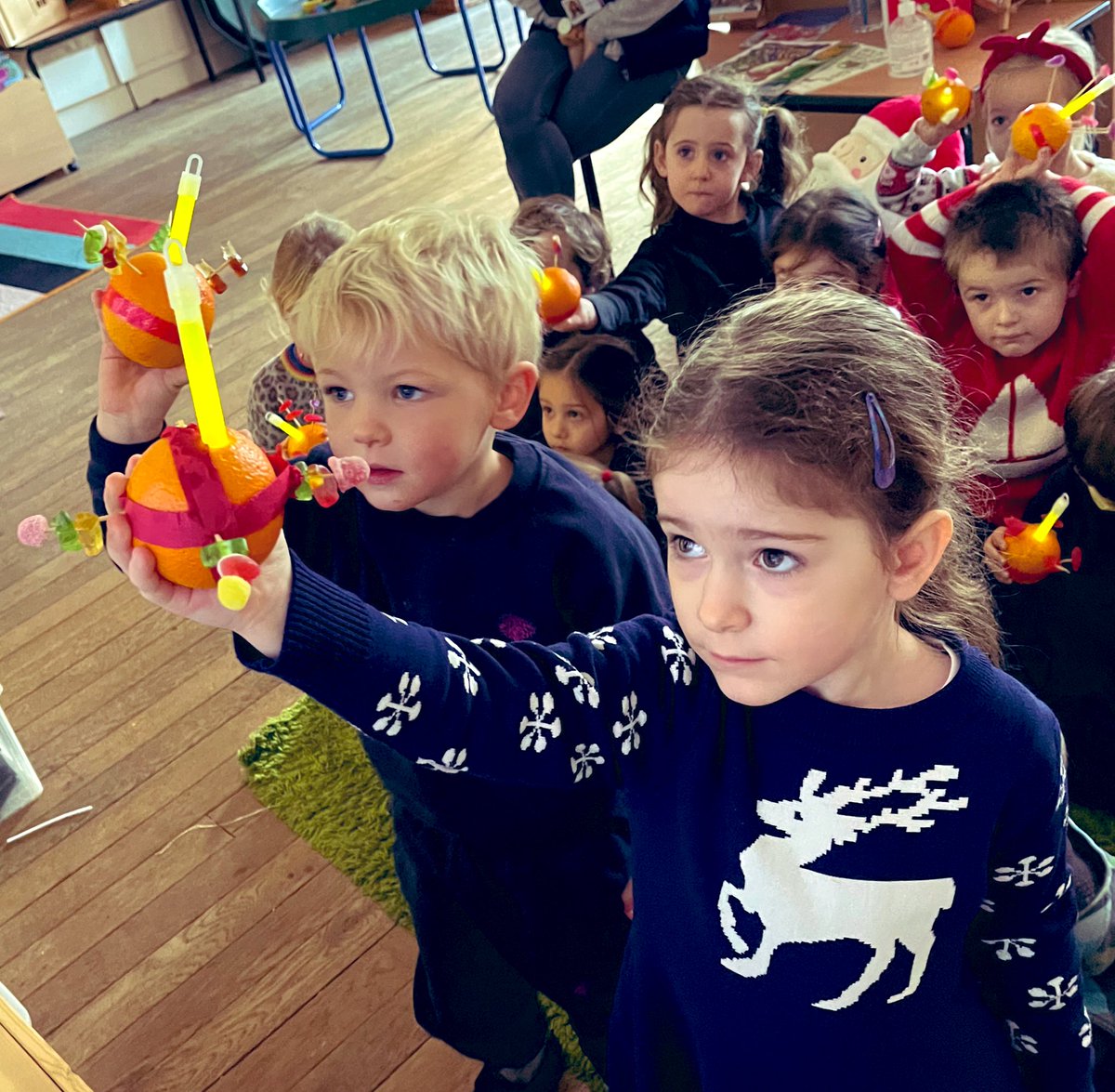 CarrdusRec's tweet photo. Reception and Nursery had a wonderful time making Christingles and sharing them with our friends across the school during a very special celebration assembly today. We learnt all about what they represent and their importance at this time of year. @CarrdusSchool @CarrdusNursery https://t.co/s5ZEeOtY5V