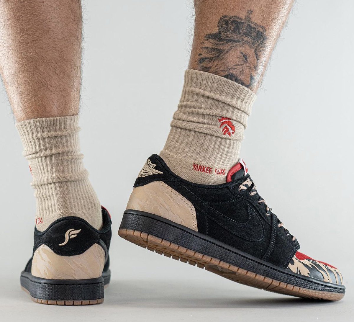 On-feet photos of the new “Carnivore” SoleFly x Air Jordan 1 Low. =>bit.ly/lovesneakernews