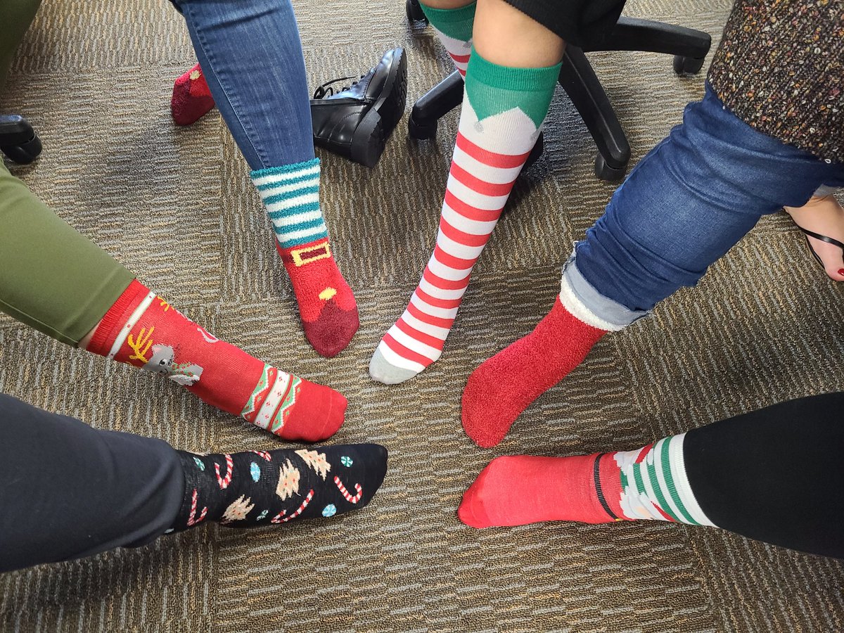 TALeibold's tweet photo. Dec. 1st! Did you show your holiday spirit today? The @nisdsis staff did with their Holiday Socks! #NISDReunited https://t.co/WZrteEXRt2