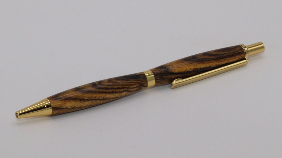 Sc0FF's tweet image. Here’s the result of my first pen - a pencil in this case.   I was tired of moving the ziploc bag of pen supplies I was given years ago around my shop so I thought I’d just go ahead and make one.    It’s actually pretty rewarding holding it.
#woodworking  #woodturning #penturning
