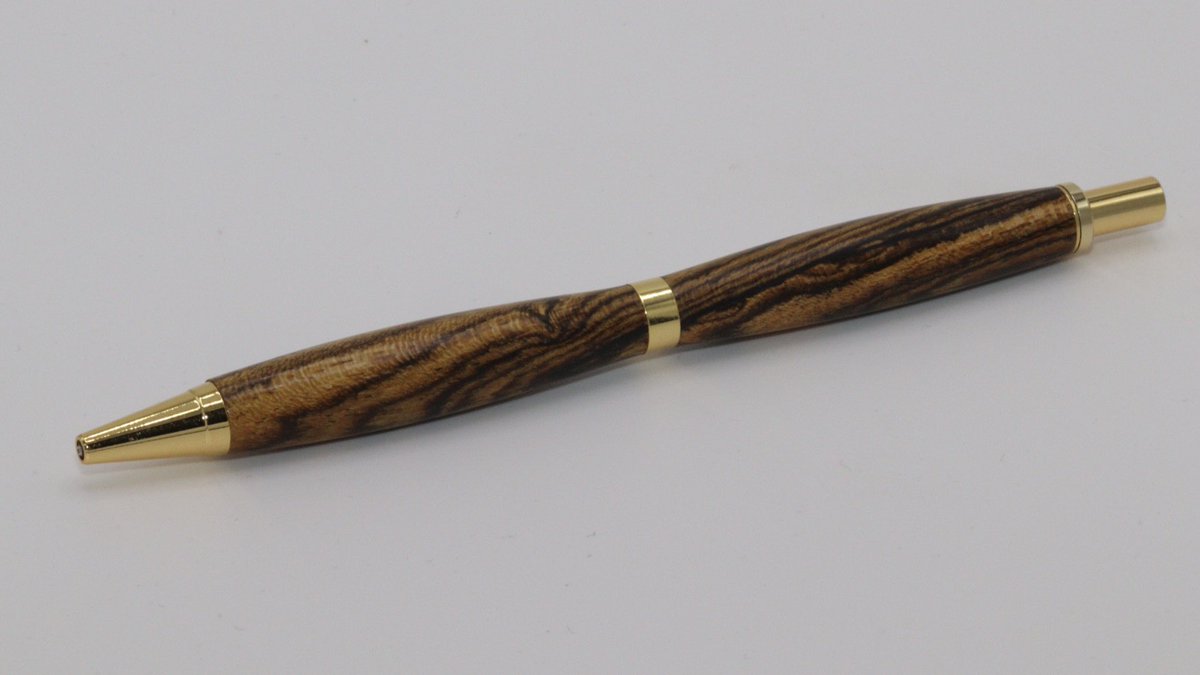 Sc0FF's tweet image. Here’s the result of my first pen - a pencil in this case.   I was tired of moving the ziploc bag of pen supplies I was given years ago around my shop so I thought I’d just go ahead and make one.    It’s actually pretty rewarding holding it.
#woodworking  #woodturning #penturning