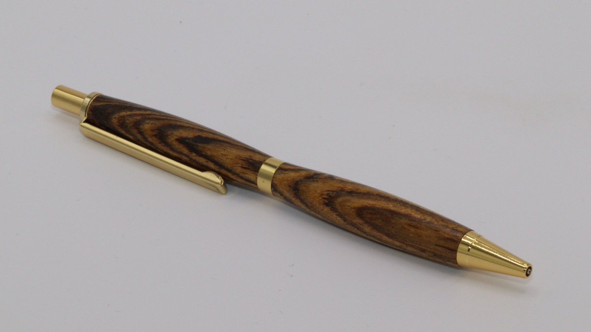 Sc0FF's tweet image. Here’s the result of my first pen - a pencil in this case.   I was tired of moving the ziploc bag of pen supplies I was given years ago around my shop so I thought I’d just go ahead and make one.    It’s actually pretty rewarding holding it.
#woodworking  #woodturning #penturning