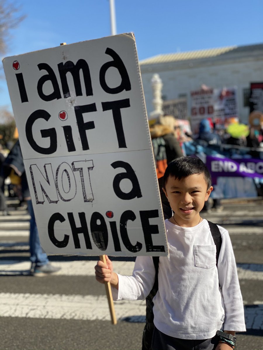 christineyeargs's tweet photo. Scrolling the photos I took at the Supreme Court rally today and this is, by far, my favorite. Life is a gift. 🤍 https://t.co/aHLrHTQcuG