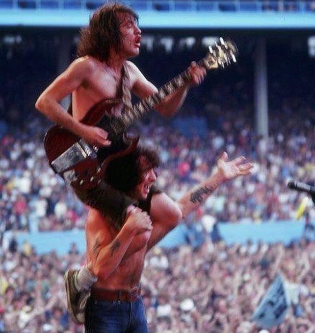 crockpics's tweet image. Bon Scott and Angus Young in Cleveland, 1979.