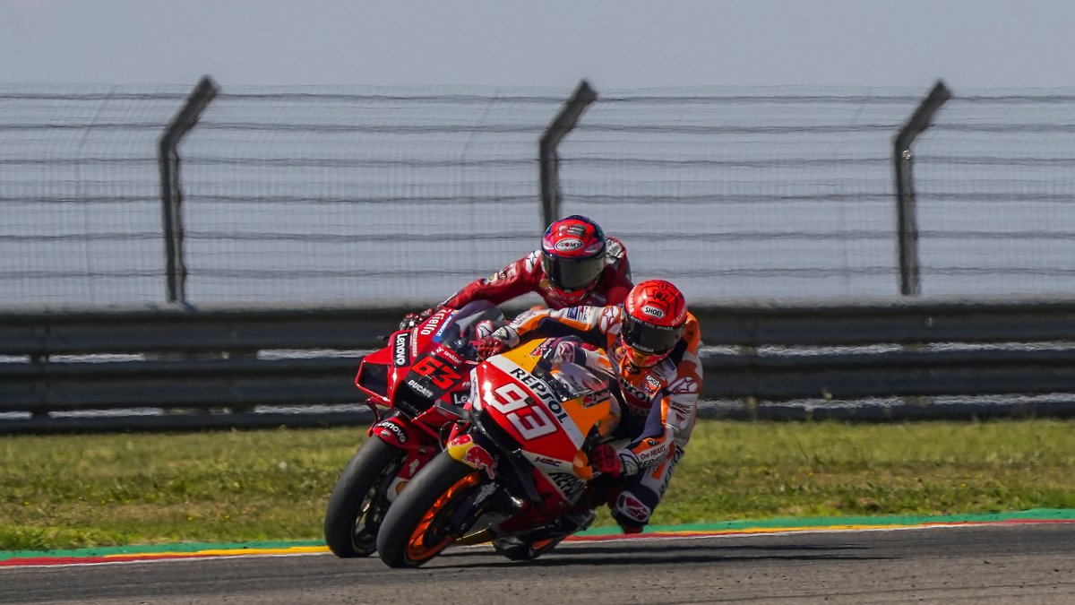 ducaticorse's tweet photo. #TBT Pecco's win at the #AragonGP has been picked as one of your favourites! So here are the best snaps from that nail-biting battle between @PeccoBagnaia and @marcmarquez93! 🙌 What a race, guys! 🤯 

#ForzaDucati #DucatiLenovoTeam https://t.co/CjZfntzQMy