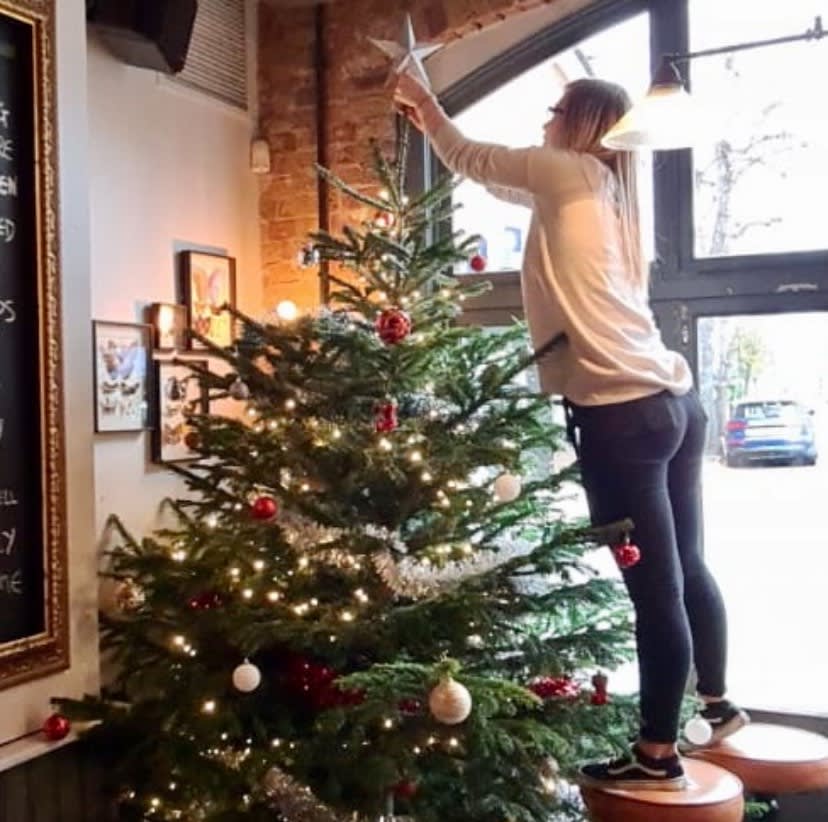 TeddingtonArms's tweet photo. Getting those decs up ready for Christmas 🎄 Didnt pull the tree down getting the star up there, we’re calling that a win 💪 #teddyxmas #talltree #getbooking #teddington https://t.co/G95xB3S0rG