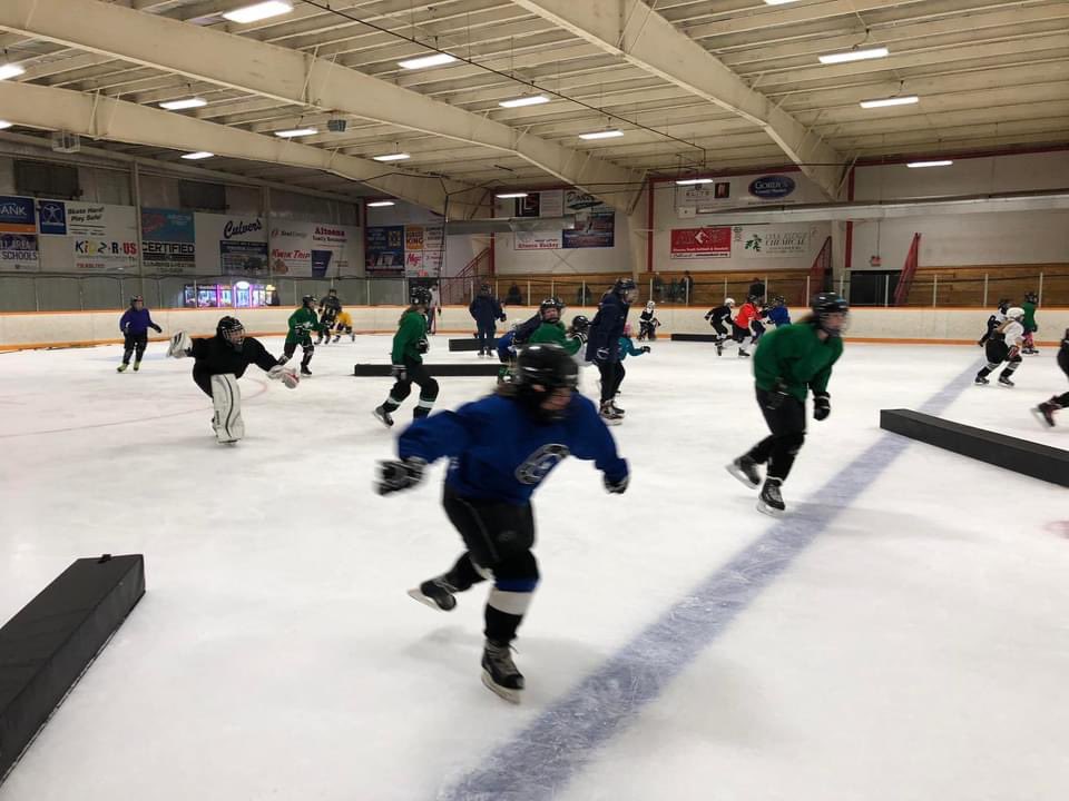 UWECWhockey's tweet photo. Blugolds Give Back! 
Every 💙💛 volunteers at least 1 practice a month.  This means our team works with 4 teams a week. Blugolds helping out at practice and the younger girls love having their role models at practice each week. #GrowtheGame #ecastars #14u #12u #10u #8u #minimites https://t.co/uK21gKKZYm