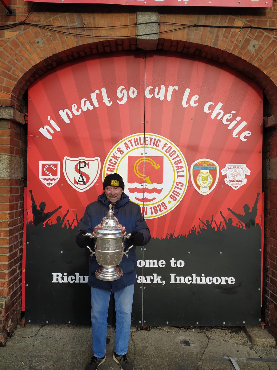 dave_pats's tweet photo. Anto Maguire, Head Groundsman and longest serving employee of @stpatsfc getting his hands on the cup 🏆 https://t.co/vXNE0JjGhN