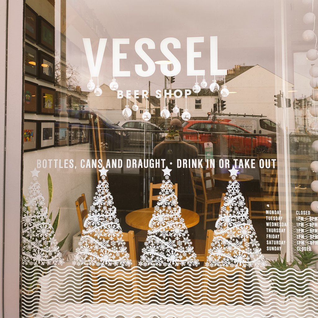 VesselPlymouth's tweet photo. Open 1pm to 9pm today. Katie has been busy making the windows festive whilst we've been closed. 
Here's our current tap list. https://t.co/zIFe3iQy8R