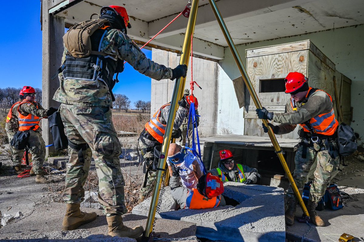 AirNatlGuard's tweet photo. Members of the @NENationalGuard's #CERFP respond to a simulated building explosion collapse during an exercise in Mead, Neb. The training tested team's ability to move in a convoy & quickly set up/operate a field medical facility in a remote location. 🔗https://t.co/wdGgRv9iax https://t.co/s01OhGLzaT