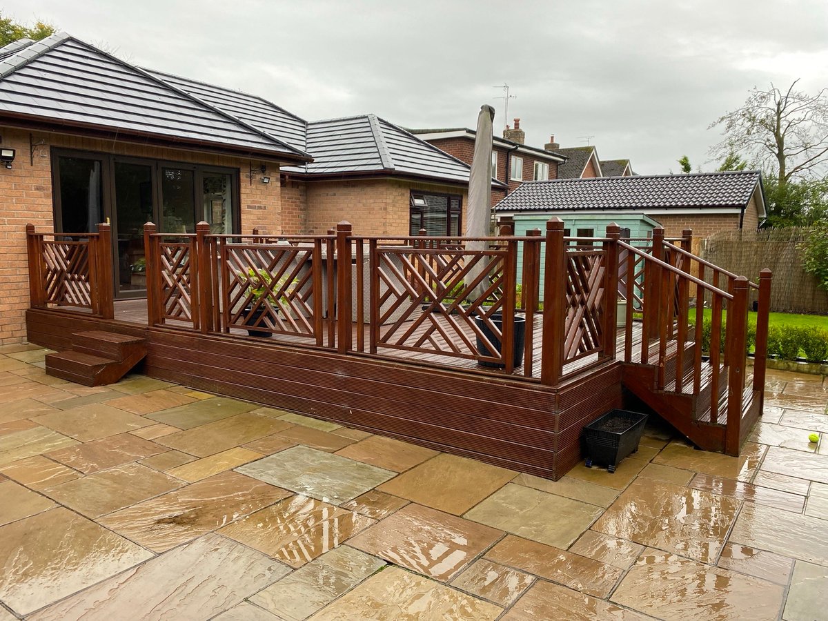 elitebalustrade's tweet photo. Another project transformation carried out by one of our approved installers. HD Dual Walnut Decking from #compositeprime with Edge Mounted Mini Post Glass Balustrade. https://t.co/7s1HSvbo6Y