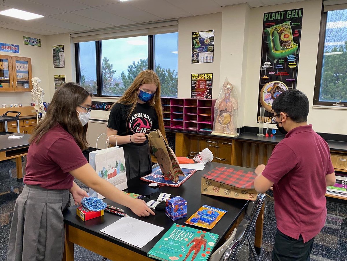 cjbschool's tweet photo. The 8th Grade NJHS students partnered with the @OrlandTownship "Adopt a Family" Program for their December Service Project.  The students brought in gifts to wrap for teens to donate this Christmas season. Great job NJHS! 

#wearebettertogether
#helpingothers https://t.co/PhEICNJmYd