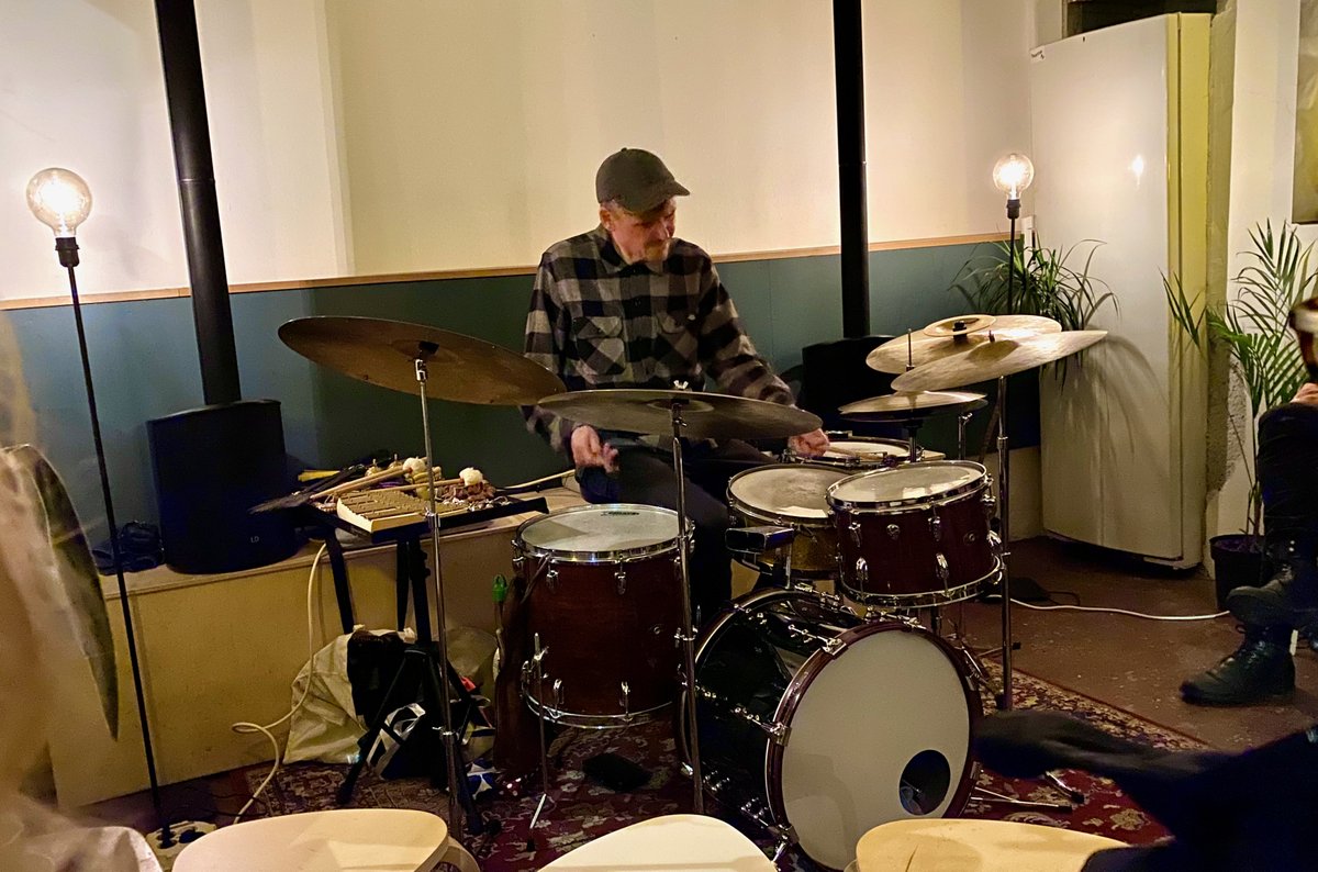 TuomasVaittinen's tweet photo. ”This is how I am, this is what I do.” :) Delightfully cozy #WeJazz2021 gig at @Kahvilasavy yesterday. Teppo Mäkynen playing drums over an ambient electronic track he had prepared. Felt like a full concert, not like an extended drum solo. And nothing wrong with long drum solos :D https://t.co/PThew6VyUz