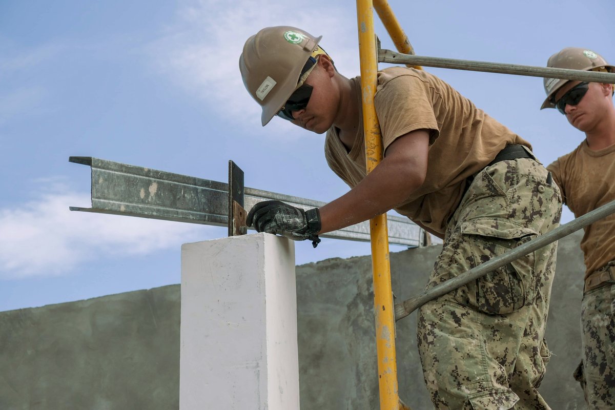 USNavy's tweet photo. Building on more than just #NavyPartnerships ⚒️
#Seabees assigned to #NMCB5 & members of @TeamAFP's 565th Construction Engineering Battalion work on various construction projects throughout the Indo-Pacfic region during #PacificPartnership21. https://t.co/4u4QbmcUUE