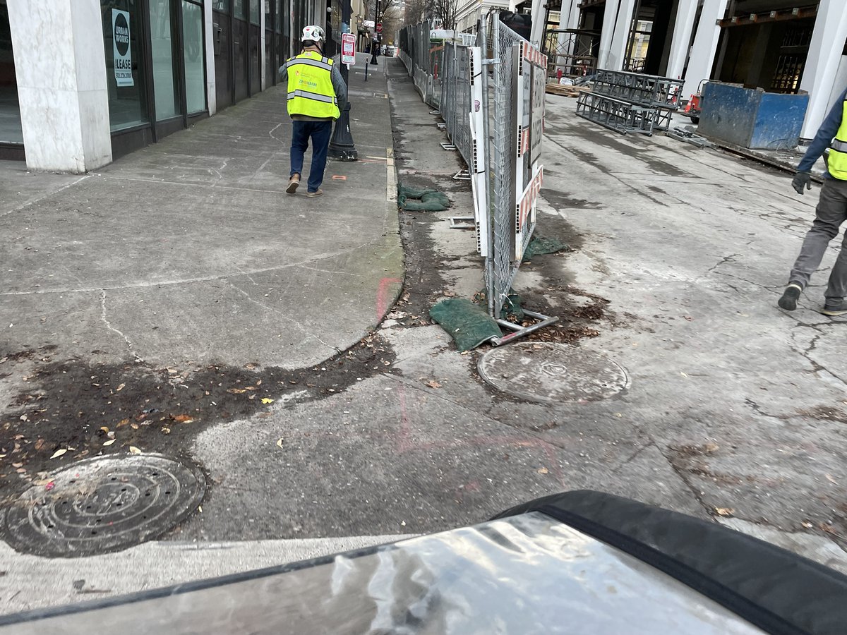 Riding into work today on probably the busiest or second busiest bike route, this what we encountered. Leaves covering the bike lane (many weeks after they’ve fallen), a car parked in the protected bike lane, and a totally inaccessible work zone.