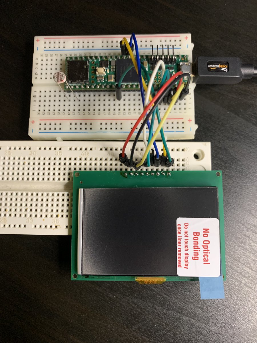 NotTheWorstDev's tweet photo. I made these breakout boards to test the @azumotech #LPM027M128B reflective display. Thanks @JLCPCB for manifacturing and soldering those super tiny FPC connectors. Now the challenge is developing the firmware to drive the display. https://t.co/N8IIP3tc9A