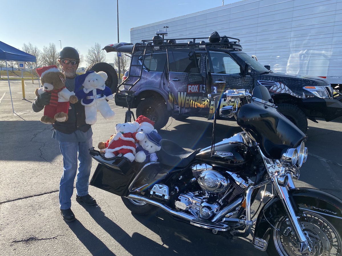 We were really confused when this guy pulled up to our Candy Cane Corner donation drive but then he popped open his saddlebag and it basically exploded with teddy bears! <a href="/fox13/">FOX 13 News Utah</a>