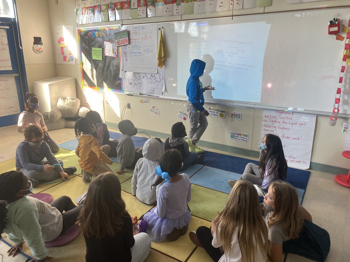 mrs_meads's tweet photo. Students explaining to their classmates the strategies they used to solve our productive struggle in math 🤩 @CarneyElem https://t.co/IfKiAGUtz3