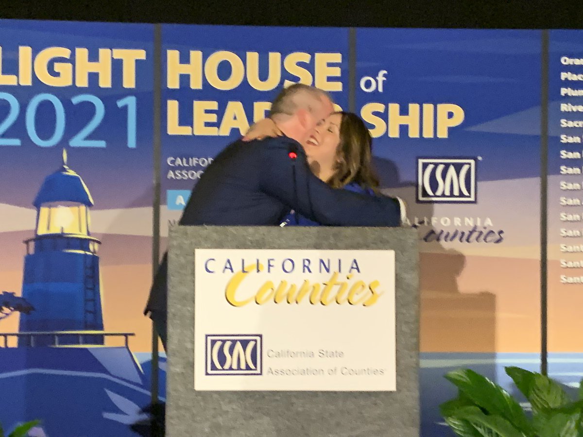 CSAC_Counties's tweet photo. CSAC President and @CounyofSonoma Supervisor James Gore presents the President's Award to his 4th District Director Jenny Chamberlain for her tireless work as his representative in #SonomaCounty. Congratulations, Jenny, on your well-deserved award! @GoreCountry #CSACAM2021 https://t.co/XlUvhwjjud