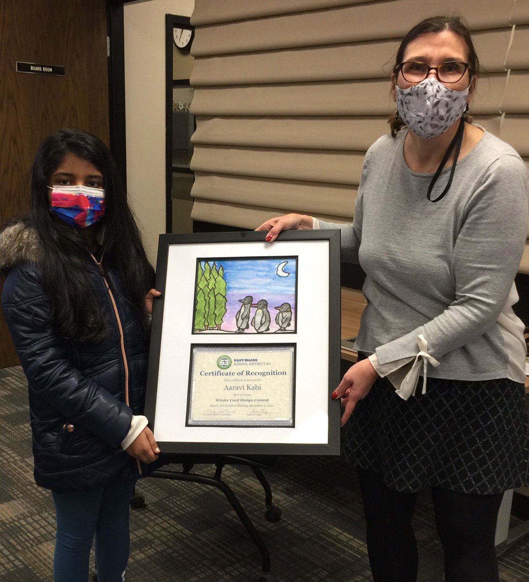 EastMaine63's tweet image. A round of applause for our Winter Card Contest winner, @apolloD63 3rd grader Aaravi Kabi - pictured here with Board President Alexandra Brook -and all of our Best in Grade winners! #63success
