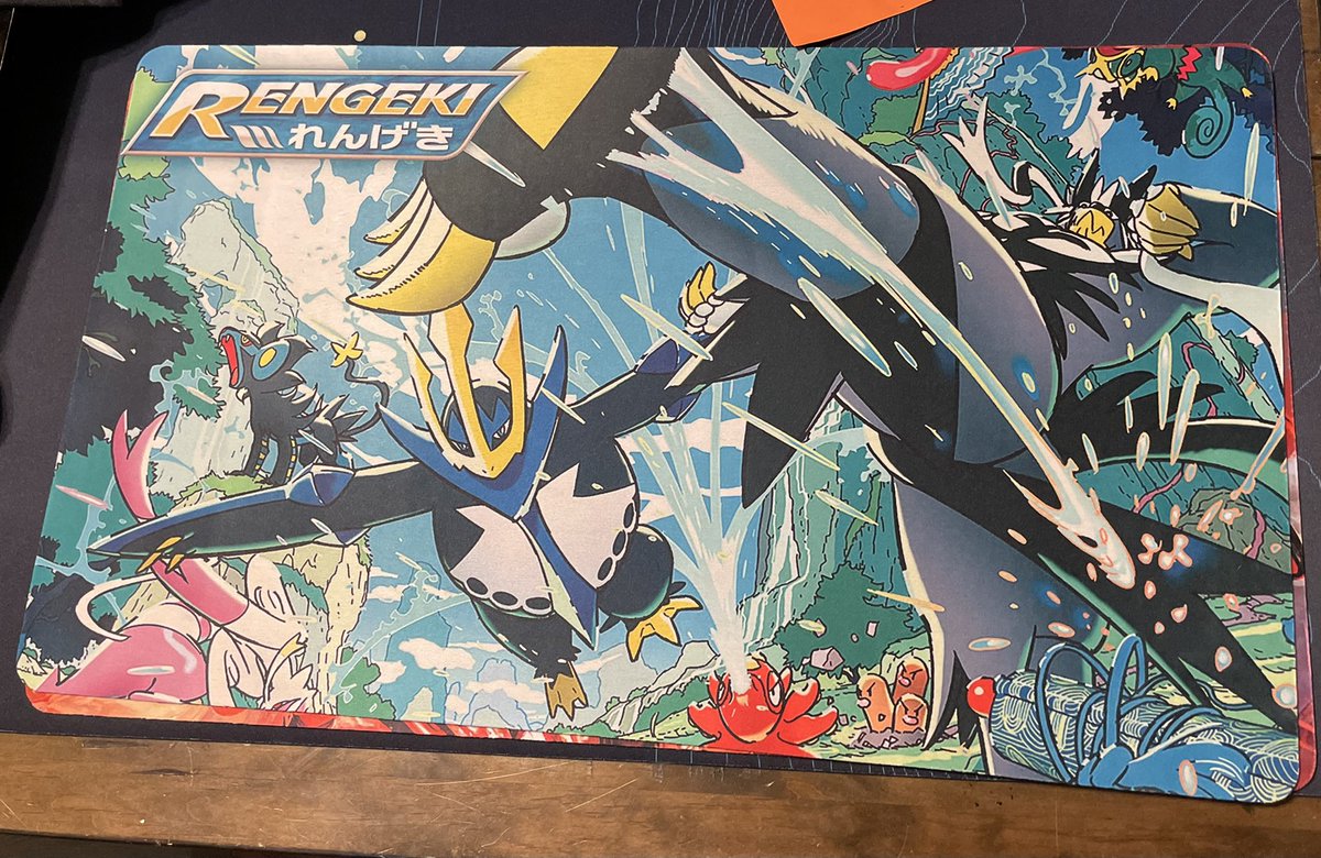 tim_sheridan's tweet photo. Can we just take a second to appreciate how gorgeous these mats are that I just got in? I met a guy at a local tournament who had one and showed me the link so I had to snap one of each! #Pokemontcg #Singlestrike #Rapidstrike https://t.co/P4PUAnlXxP