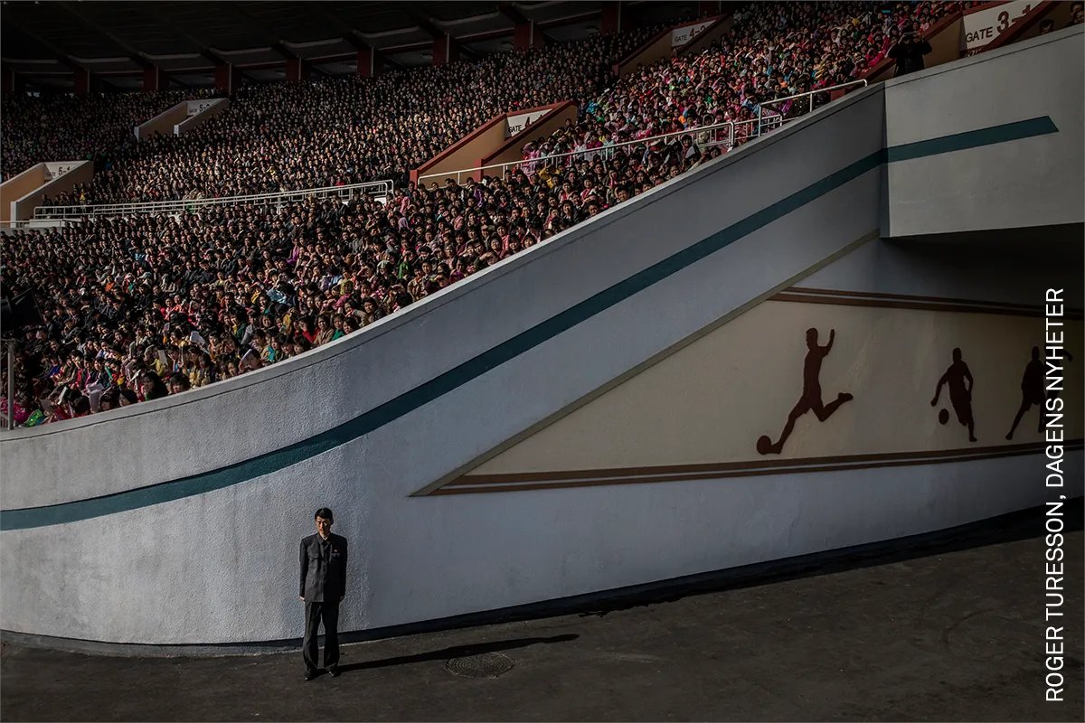 Photo of the Day | A crowd awaits the start of the Pyongyang Marathon at the Kim Il-sung Stadium, while thousands more gather on the streets in Pyongyang, North Korea, in 2017. Discover the #WPPh2018 awarded photo by <a href="/rogerturesson/">roger turesson</a> for <a href="/dagensnyheter/">Dagens Nyheter</a>: bit.ly/3rqPy9k