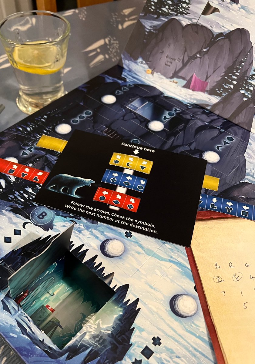 Pieces of an advent calendar come board game showing first door open.