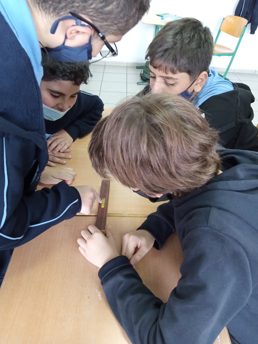 RazanAlbaba2's tweet photo. Grade 8 students are using a bubble level and a plumb bob to measure the accuracy of  straightness, but with a different relationship to the horizon. @Hhhsinfo https://t.co/oLJNptihpK