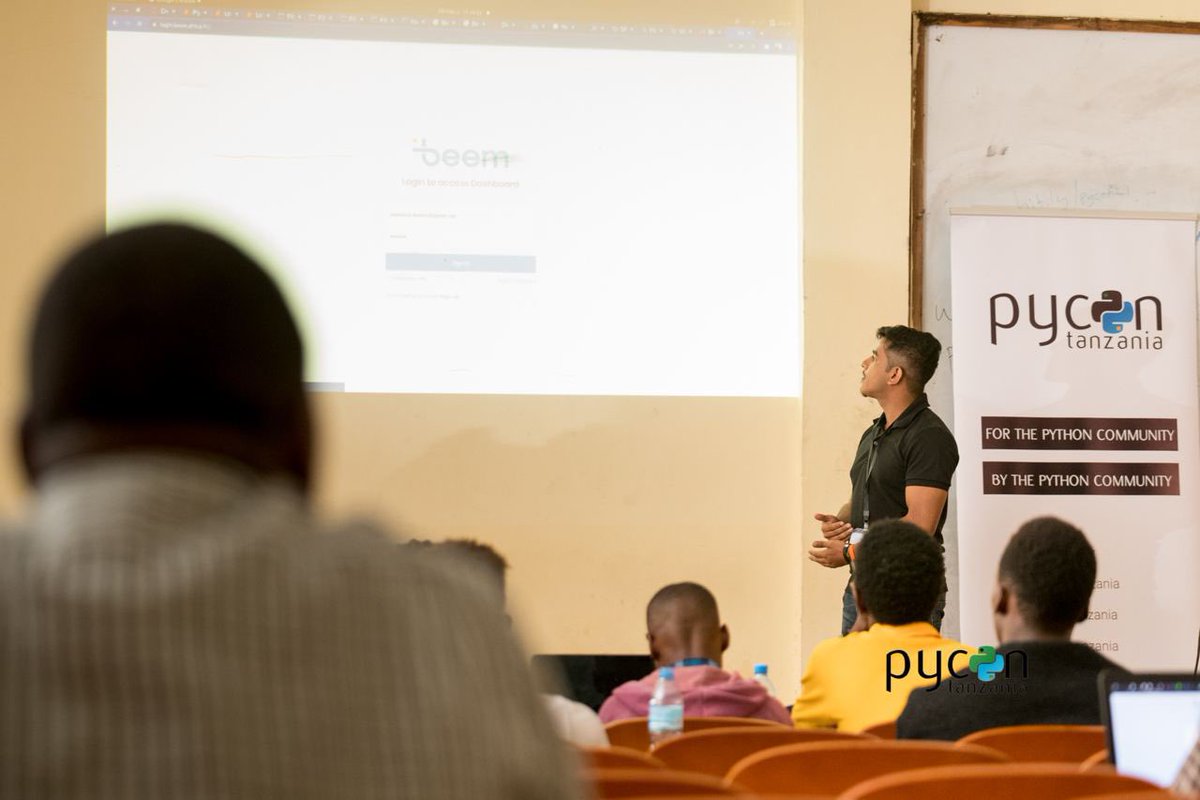 BeemAfrica's tweet photo. Our software developers Mustafa & Zephaniah taking the participants the Beem challenge i.e creating a python script for the BPAY checkout,As well as helping them sign up to the platform so that they can access the authentication key and secret. #pycon2021 #pycontz2021 https://t.co/hQyXYFb6sC