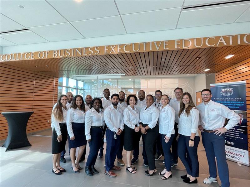 faumbasport's tweet photo. A small sample of the tremendously talented and ultra friendly staff that keeps one of the top Executive Education programs in America running smoothly. #Nobodydoesitbetter. #SchmidtDedicationDay #Awesomepeople @faubusiness @FAUExecEd @vegarwiik #sybilalfred #kenjohnson https://t.co/xe7ZmQNxhI