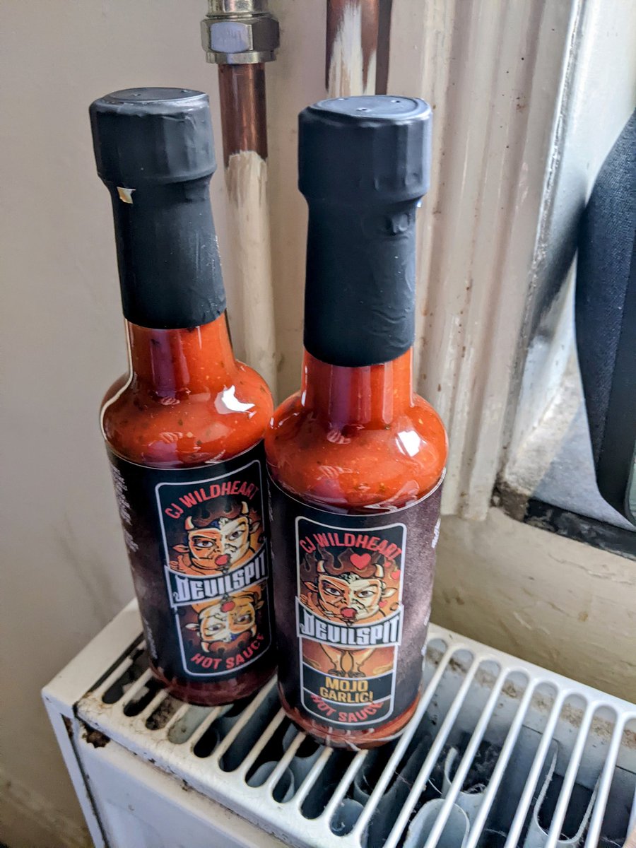 evmitch's tweet photo. @CJWildheart Look what arrived this morning! Can't wait to try them! Thank you Sir! #devilspit #mojo #garlic #hotsauce https://t.co/YJCDgVHN64