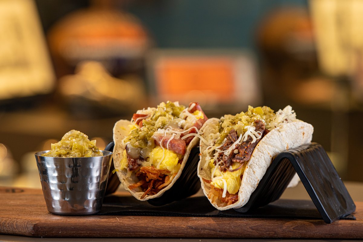 You may have seen breakfast tacos but you haven't had ours. 😎 With hash browns, scrambled eggs, tender short ribs, andouille sausage, or grain mix served with Monterey jack finished with salsa verde in a corn tortilla - these breakfast tacos are mouthwateringly good. 🌮
