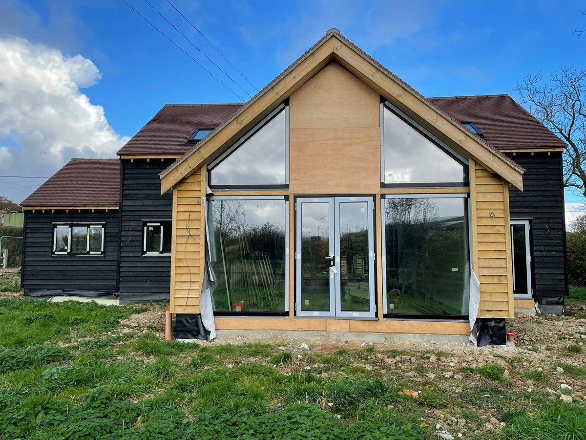 BlinkArch's tweet photo. Work is well underway on this new open plan barn style dwelling in Woodchurch. The construction uses insulated concrete formwork (ICF) for the walls and will feature a central spiral staircase to the upper bedrooms offering amazing views over the surrounding countryside. https://t.co/tpOivqDbui