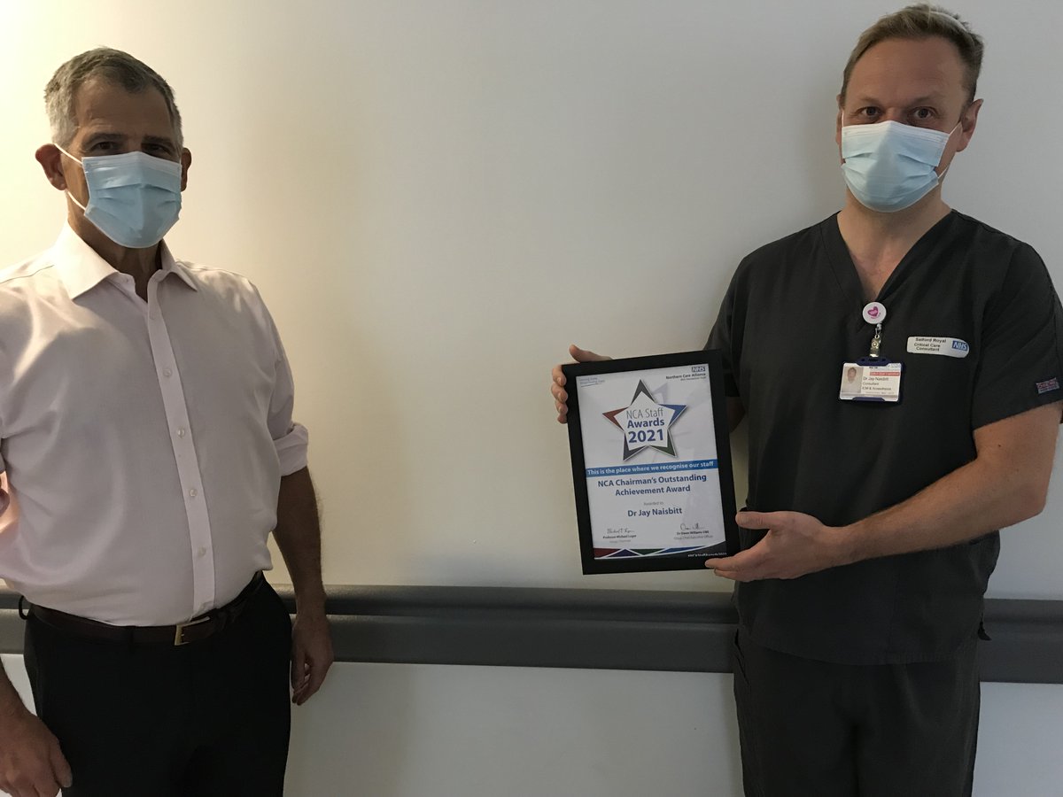 NCAlliance_NHS's tweet photo. Our first award of the day is the NCA Chairman’s Outstanding Achievement Award.

The award goes to Dr Jay Naisbitt, ICU Consultant at Bury and Salford Care Organisations. Well done to Dr Naisbitt pictured receiving the award from NCA Chairman Michael Luger! #NCAStaffAwards2021 https://t.co/ZWGhER5bVR