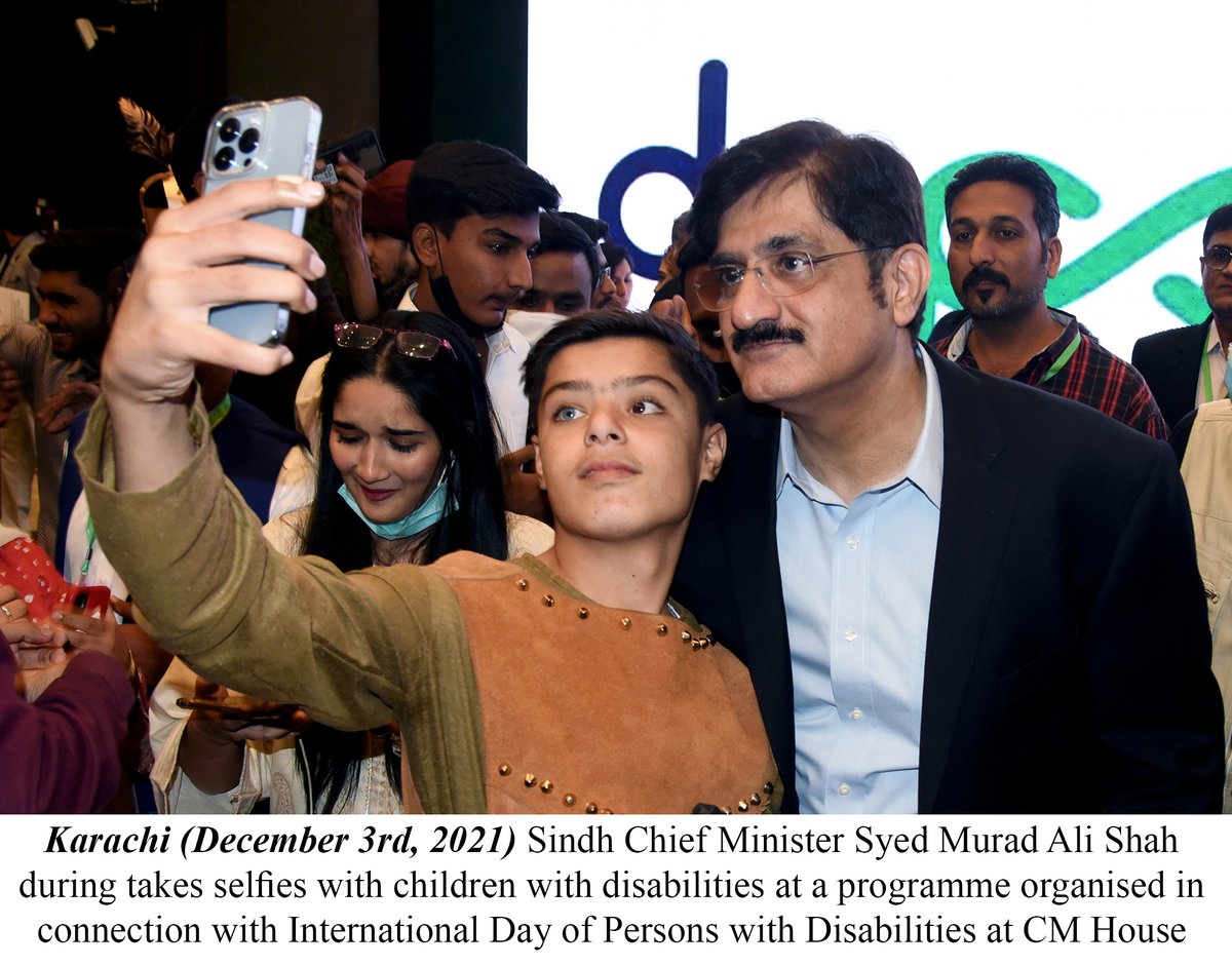 Karachi (December 3rd, 2021) Sindh Chief Minister Syed Murad Ali Shah  during takes selfies with children with disabilities at a programme  organised in connection with International Day of Persons with Disabilities  at