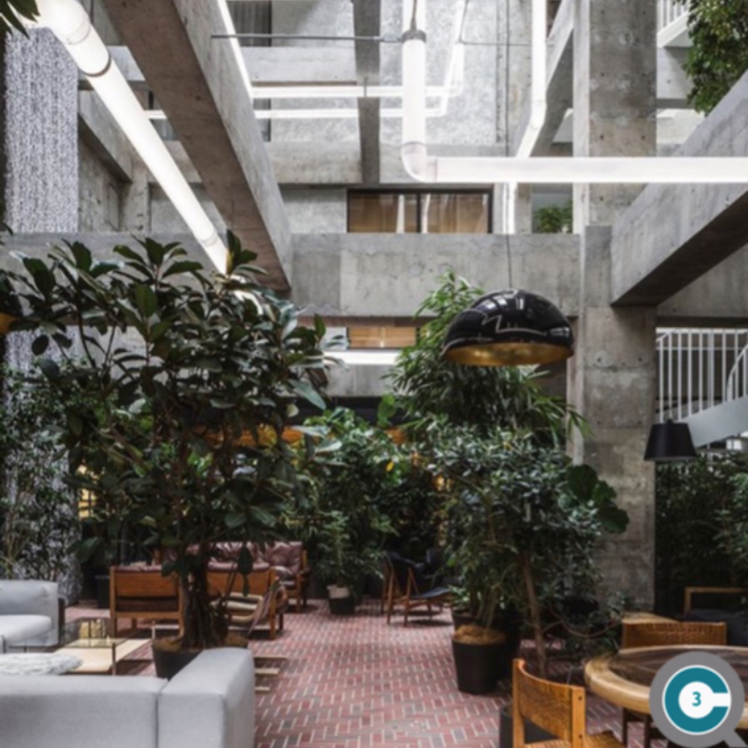 concretecentre's tweet photo. The frame of this 1970s Japanese hotel has been exposed to show the rough surface of the original structure. The result is this beautiful criss-cross of concrete beams which is complemented by artistic lighting pipes.​ #day3 #24daysofCQ #autumn21 https://t.co/dNdMWhcAnO https://t.co/NZ3k9EWHsw