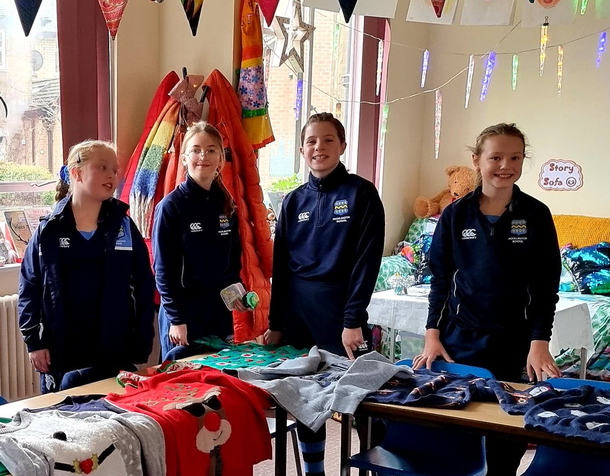 Reps at the ready! #ChristmasJumper sale today in <a href="/MrsBonnieSteel/">MrsSteel</a>'s classroom for <a href="/BreastCancerNow/">Breast Cancer Now</a>🎀 Saving the world, one jumper at a time! #recycle &amp; #reuse 🎄🎅🎁