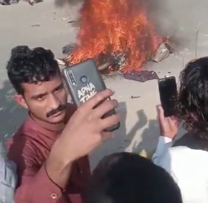 shewolf332's tweet photo. I see humans, but no humanity. This is just horrific! 
#Sialkot https://t.co/xKpOKWz7JL